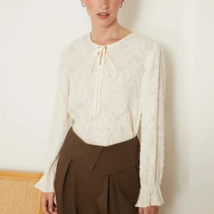 Creamy lace up blouse